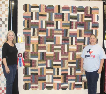 Cathy McCoy, right, was named as the winner of the ‘Mayor’s Choice’ award during the Texas Star Quilters Guild in Canton. Standing with the winner is Canton Mayor Lou Ann Everett.