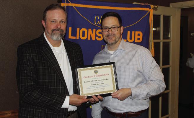 Canton Lions Club President Jonathan Helvey, right, presented a ‘Certificate of Appreciation’ to Attorney at Law Richard Schmidt following Schmidt’s presentation April 16 during the Canton Lions Club weekly luncheon at Ole West Bean and Burger. Photo by David Barber