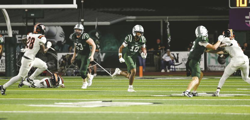 Defense puts the clamps on Tigers in 61-14 win