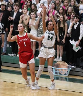 Amari Welch attempts a three-pointer in the final minutes of regulation during Canton’s 45-42 loss to Van on Friday night. Photo by Lianna Reid