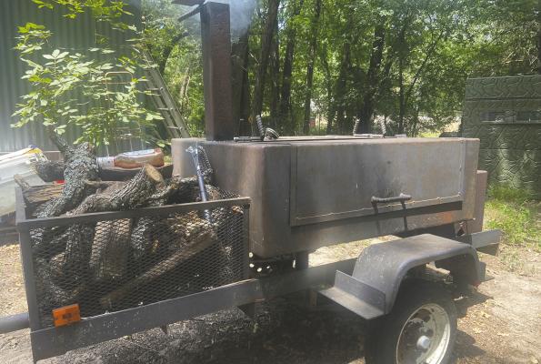 Photo by Luke Clayton Luke gave his old smoker a try over the weekend but decided his electric smoker was much easier to work with and besides, it makes better barbeque!