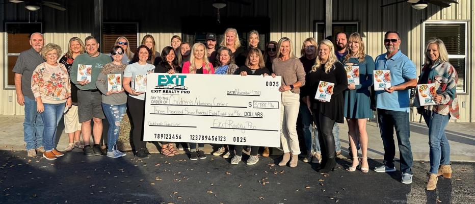 The Van Zandt County Children’s Advocacy Center received a donation Nov. 1. The donation was made possible through the efforts of EXIT Realty Pro agents and the sale of cookbooks featuring submitted recipes. Photo by David Barber