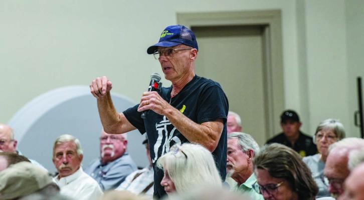 Republican Club of Van Zandt County President Doc Collins was one of several in attendance asking questions during a Town Hall Meeting June 6 hosted by United States District 5 Congressman Lance Gooden at the VZC Farm Bureau Event Center in Canton. Photo by Faith Caughron