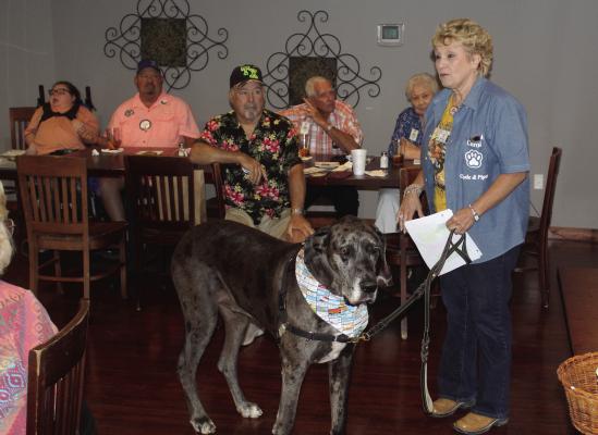 Carol Wood, representing Therapy Dogs of Van Zandt County, introduced ‘Clyde’ to those in attendance during the weekly Canton Lions Club Luncheon Aug. 16 at the Van Zandt Country Club. Story on page 6A. Photo by David Barber