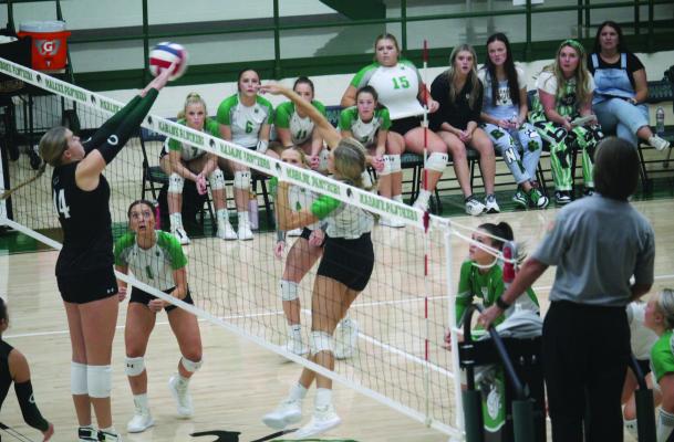 Kylee Curry of Canton, left, goes up for a block against Mabank Sept. 20 in Mabank. The Canton Eaglettes defeated the Mabank Lady Panthers 25-23, 25-17, 25-18. Photo courtesy of The Monitor