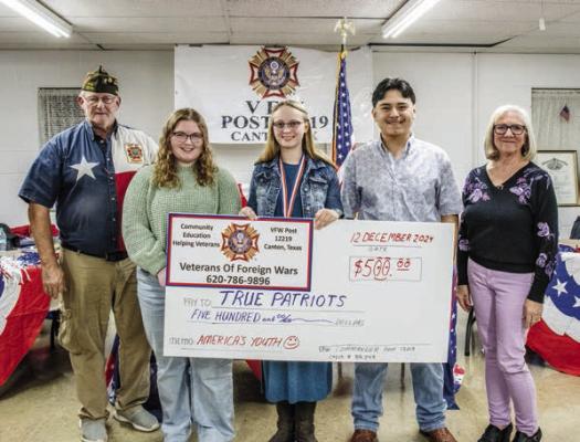 Veterans of Foreign Wars (VFW) 12219, Canton, recently announced the Voice of Democracy essay scholarship winners. Shown left to right were VFW 12219 Commander Dan Curtis; Elise O’Mara, Beth Jennings, Kevin Cervantes, and Voice of Democracy contest chair for the VFW Dayna Hoster. Photo by Faith Caughron