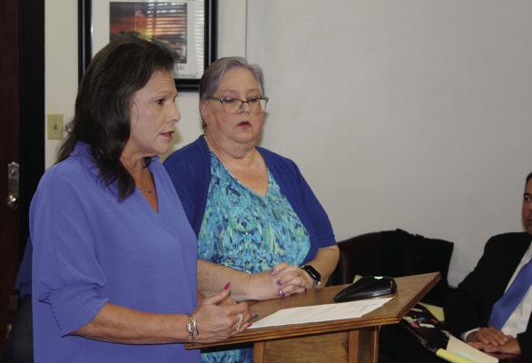 Van Zandt County Clerk Susan Strickland, left, and Shannon Maddox from the VZC Clerk’s office visited with the VZC Commissioners Court during its special called meeting Oct. 3 to discuss the need to create a new position of VZC Elections Administrator. The commissioners’ court unanimously approved the request to add the position. Photo by David Barber