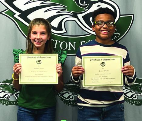 Aniston Geren led in the invocation and Kason Woods led in the Pledge of Allegiance at the beginning of the regular monthly meeting of the Canton School Board Oct. 21. The two students are fifth graders at Canton Intermediate School. 