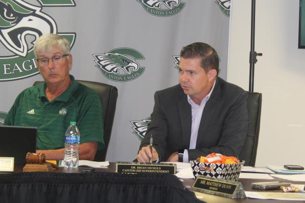 Canton ISD Superintendent Dr. Brian Nichols, right, presented his monthly report July 24 during the regular monthly meeting of the Canton School Board. Shown with Nichols is Canton School Board President Kenneth Pruitt. Photos by David Barber