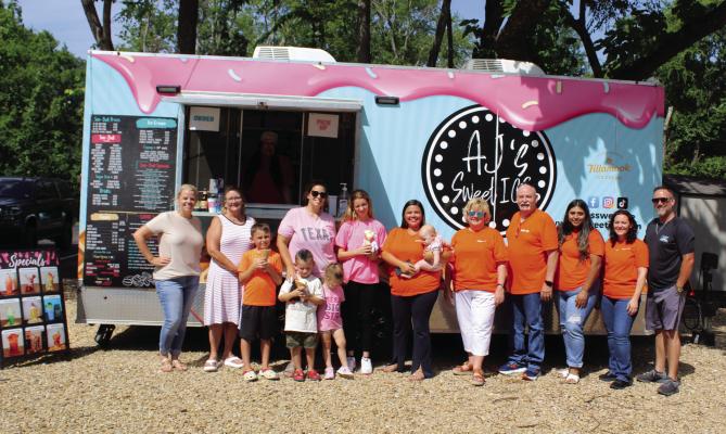 Exit Realty Pro and M-Squared Management L.L.C. in Canton held a Customer Appreciation Event at their business locations July 2. A.J.’s Sweet Ice, located in Grand Saline, was in attendance to serve snow cones and ice cream cones. Photo by David Barber