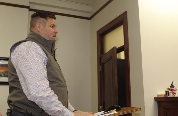 Photo by David Barber Van Zandt County Fire Marshal Kevin Palmer discussed a revised fire marshal fee schedule as well as a community education period regarding outside burning March 12 during the regular meeting of the VZC Commissioners Court. The commissioners’ court approved the revised fire marshal fee schedule unanimously.