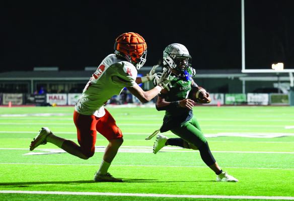Josue Galan (dark uniform) crosses the goal line on a touchdown run against the Kemp Yellowjackets Oct. 10 on Homecoming night at Norris Birdwell Stadium. The Eagles dominated the Yellowjackets, 63-0, and will carry their undefeated record into Wills Point Friday at 7 p.m. as they will face their Van Zandt County rival, the Wills Point Tigers. Photo by Don Johnson