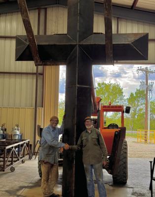 David Broussard is hard at work on his “River of Angels Cross” project. The one-ton steel cross will be accompanied by 119 angels to honor the lives lost in the Texas Hill Country flood last year. Photos by David Broussard