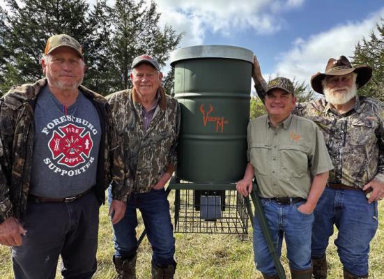 Setting up a Vineyard Max deer feeder on the Gresham Ranch after a bit of scouting. Photo by Luke Clayton