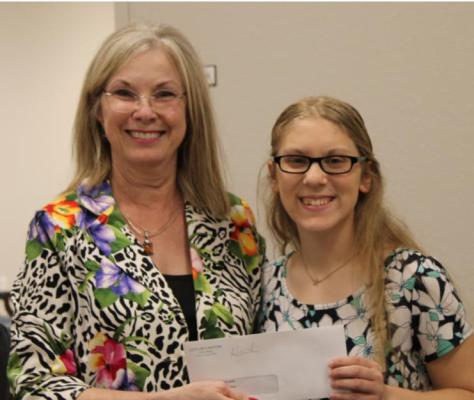 Canton Mayor Lou Ann Everett presented Catherine Hooks and Raeleigh Strickland (not pictured) with the Sanitation Solutions scholarships. Photo by Britne Hammons