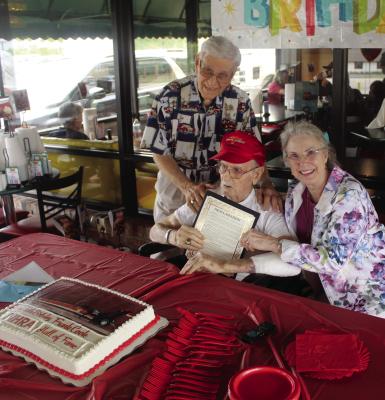 Frank Cook, a Canton resident and a National Hot Rod Association Hall of Famer, was recognized on his 88th birthday as several friends and relatives attended a party in his honor April 4 at Dairy Palace in Canton. Among those in attendance were Frank Cook’s brother, Bill, and Canton Mayor Lou Ann Everett-Berry. Photo by David Barber