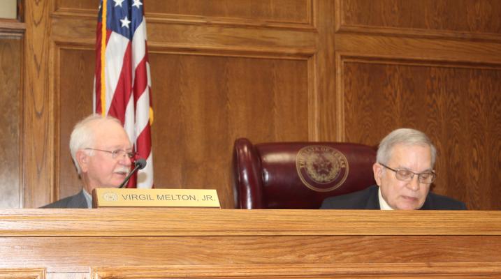 Van Zandt County Pct. 2 Commissioner Virgil Melton Jr., left, responds to a question from VZC Judge Andy Reese during a special called meeting Oct. 23 of the commissioners’ court. Photo by David Barber