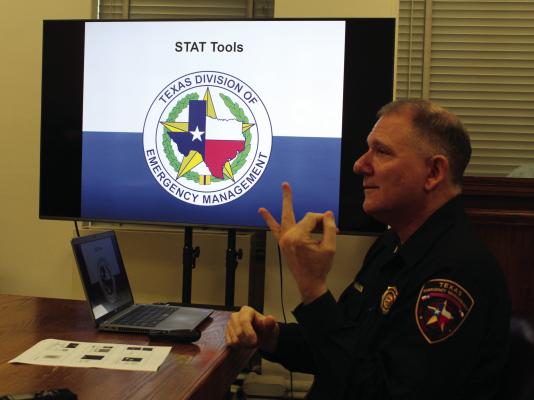 Ken Bell with the Texas Emergency Management Division (TEMD) spoke during an emergency session of the Van Zandt County Commissioners Court June 3 about the process of reporting damage caused by recent storms in VZC. Photo by David Barber