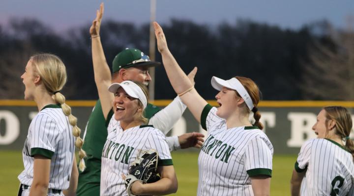 Eaglette teammates celebrate following Canton’s triumphant 8-7 win over Mt. Pleasant on Feb. 28. Photo by Lianna Reid