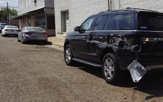 On Thursday, Aug. 24 at approximately 3:30 p.m., on the corner of Buffalo Street and Tyler Street in Canton, a black SUV parked on Tyler Street outside of Latham Bakery was struck by another vehicle. The incident handled by the Canton Police Department. Photos by Deidre Pennell