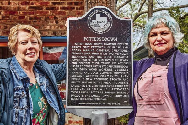 Cynthia Forsyth and Beth Brown are shown with the Texas historical marker at Potters Brown in Edom. The historical marker was officially dedicated during a ceremony March 9. The business was opened by Doug Brown, Beth Brown’s late husband, in 1971. Photos courtesy of Craig D. Blackmon, FAIA, Edom