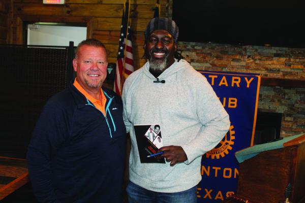 The Canton Rotary Club held its weekly luncheon Oct. 26 at Craft 64. Canton Rotary Club President Brian Lea, left, expressed his appreciation to guest speaker Trevon Feguson, a motivational speaker and author from Crandall. Photo by David Barber