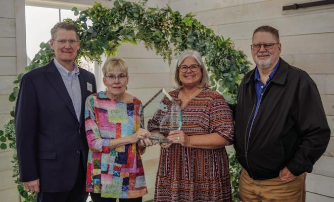 The family of the late Virgil Melton Jr. stand with the 2025 East Texas Council of Governments (ETCOG) Regional Statesman Award following an ETCOG awards ceremony March 18 in Emory. Melton served as the Van Zandt County Pct. 2 Commissioner and as an ETCOG Board of Directors and Executive Committee member. Photo courtesy of the East Texas Council of Governments