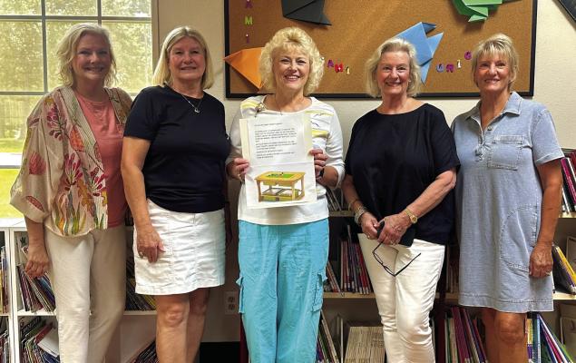 The Van Zandt County/Sarah Norman Library recently announced the donation of a table for the children’s area of the library in honor of Kathleen Stanford Barber on her 100th birthday on July 5. Standing with VZC/Sarah Norman Library Director Tonja Garten were Kathleen Stanford Barber’s daughters: Ann Miller, Elaine Gothard, Julia Beazer, and Carol Baumgarner. Courtesy photo