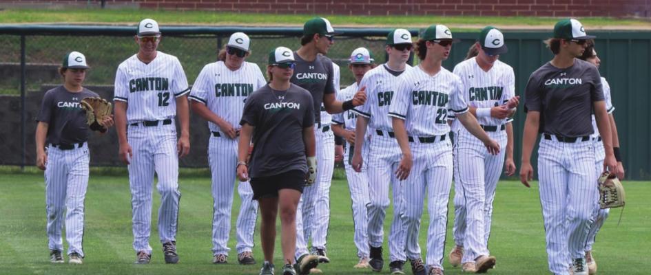 The Canton Eagles make their way across the field prior to play against the visiting Edgewood Bulldogs. Canton would come up just short in the matchup, falling by a 4-1 score. Photo by Lianna Reid gainst the visiting