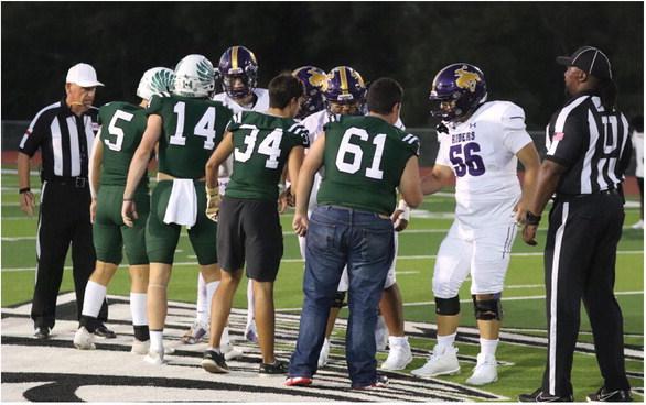 Captains for the Canton Eagles and the Center Rough Riders met at the center of the field for the pre-game coin toss leading up to kickoff of the Homecoming football game Sept. 22 at Norris Birdwell Stadium. The Eagles lost to Center, 57-34, and will play at Van Sept. 29 in a 7:30 p.m. kickoff. Photo by Lianna Reid