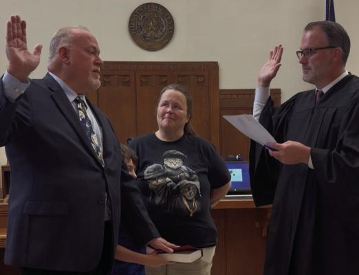 Ben Miraglia (left) was sworn in July 21 as the new Van Zandt County Auditor by VZC District Judge Chris Martin. “Please join us in welcoming him to VZC,” said VZC Judge Andy Reese. “Stop by and introduce yourself when you get an opportunity.” Courtesy photo
