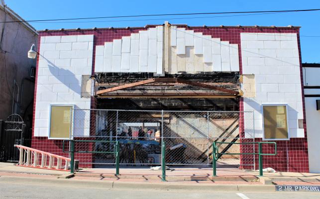 Plans to demolish the Plaza Theater in downtown Canton came to fruition this past week, as crews were busy at work. Starting by gutting the inside in preparation, the construction team worked towards tearing down the front face of the infrastructure on Tuesday, Jan. 10. Photo by Ethan Adams