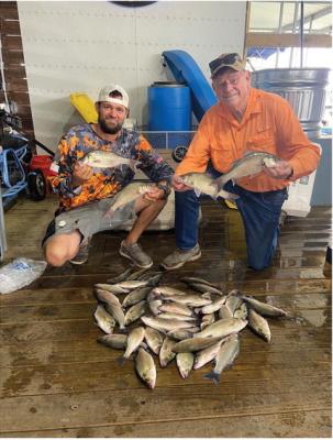 Lake Ray Hubbard guide Brandon Sargent and Luke show off the results of a couple of hours of white bass catching last week. The fish are beginning to stack up on bottom structure in deeper water and the surface schooling action is just getting underway. Photo by Luke Clayton