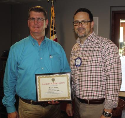 A ‘Certificate of Appreciation’ was presented to City of Canton Operations Manager Peter Lamont, left, by Canton Lions Club President Jonathan Helvey. Lamont was the guest speaker July 10 . Photo by David Barber
