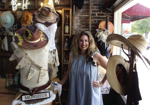 Homestead Trading Company opened its doors in downtown Canton May 25. The boutique is located at 120 West Dallas Street (State Highway 64) in Canton. Owner Kristie Christensen is shown with some of the items on display at the location. The business is open from 10 a.m. to 6 p.m. Tuesdays through Saturdays. Photo by David Barber