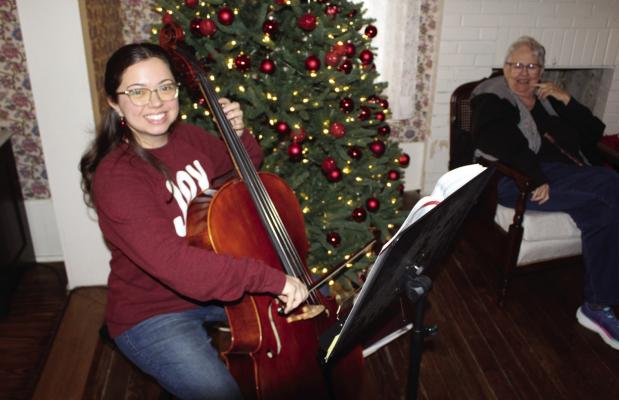 Jordin Shilling provided musical entertainment during the Annual Blackwell House Christmas Open House in Canton Dec. 4. Photo by David Barber