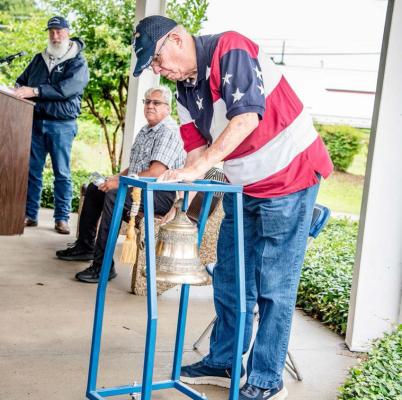 The Ringing of the Bell was led by Robert Allen, United States Air Force Retired, near the conclusion of the Annual Memorial Day Program May 26 at the Van Zandt County Veterans Memorial in Canton. Story on page 10A. Photo by Faith Caughron