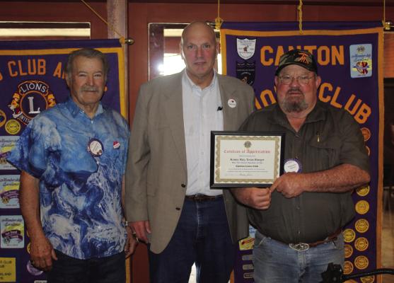 Following his presentation at the Canton Lions Club Luncheon March 4, Marsh McLennan Agency Vice-President of Safety and Risk Consulting of Dallas Kenny Ray, middle, received a ‘Certificate of Appreciation.’ Presenting the ‘Certificate of Appreciation’ were Canton Lions Club President Sandy Sims, right, and club Vice-President Doug Harrison. Photo by David Barber