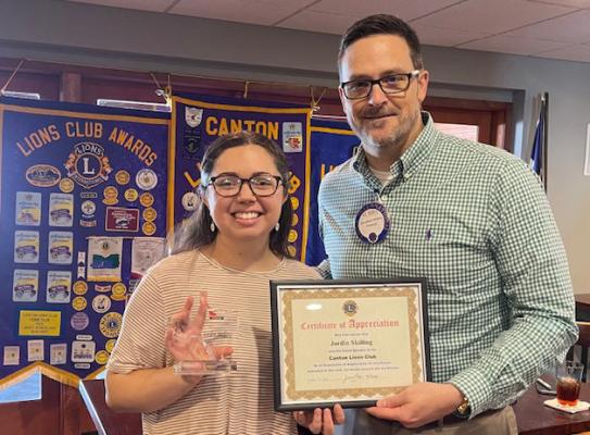 Jordin Shilling received a ‘Certificate of Appreciation’ from Canton Lions Club President Jonathan Helvey after speaking to the Canton Lions Club Aug. 21. Courtesy photo