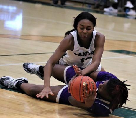Airianna Pickens fights for a loose ball during Canton’s 59-46 win over Lufkin on Friday, Dec. 9. Photo by Lianna Reid