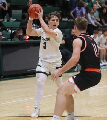Kaden Smith (3) of the Canton Eagles looks to pass the ball inside against the Grand Saline Indians Nov. 14 in Canton. Photo by Lianna Reid