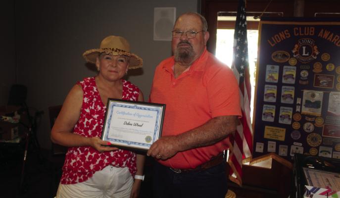 Debra Wood was presented with a Canton Lions Club Presidential ‘Certificate of Appreciation’ award June 17 during the weekly Canton Lions Club Luncheon held at the Van Zandt Country Club. Presenting the award was Canton Lions Club President Sandy Sims.