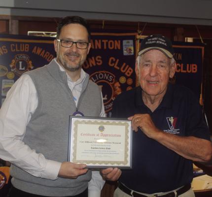 A ‘Certificate of Appreciation’ was presented Oct. 9 to Van Zandt County Veterans Memorial Board of Directors Chairman Cary Hilliard, right, by Canton Lions Club President Jonathan Helvey. Hilliard was the guest speaker at the club’s weekly luncheon at Van Zandt Country Club. Photo by David Barber