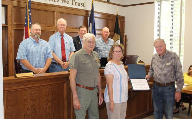 The Van Zandt County Historical Commission was recognized during the Aug. 3 regular meeting of the VZC Commissioners Court for receiving the 2021 Distinguished Service Award certificate from the Texas Historical Commission. It was the 14 th year in a row that the VZC Historical Commission had received recognition from the state. Photo by David Barber