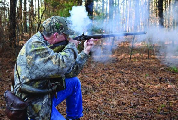 Gary Ables prefers the ultimate muzzleloader challenge, flintlock rifles. Photo by Luke Clayton