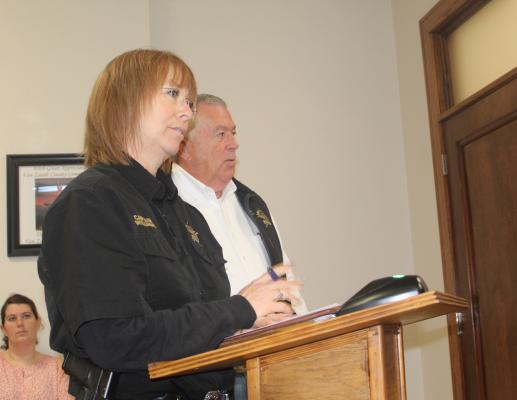 Van Zandt County Sheriff’s Department Captain Melonie Williams and VZC Sheriff Joe Carter discussed the need to exceed their budget by 25 percent to address automotive maintenance needs as well as the need to repair and maintain buildings at the VZC Jail. The VZC Commissioners Court approved the requests unanimously during their Dec. 18 regular meeting. Photo by David Barber
