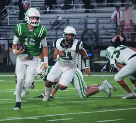 Austyn Floyd (21) of the Canton Eagles pursues Mabank quarterback Kaden Penland out of the pocket during the Eagles’ 21-0 victory at Mabank Sept. 20. The Eagles are now 4-0 for the season as they will host Rusk for Homecoming Sept. 27 in a 7:30 p.m. kickoff. Photo courtesy of The Monitor