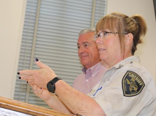 Melonie Williams of the Van Zandt County Sheriff’s Department and VZC Sheriff Joe Carter met with the VZC Commissioners Court during its regular meeting Oct. 12 to discuss clarification of the dispatch supervisor position and salary. Photo by David Barber