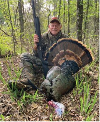 Luke shows off a heavy gobbler he took last week on what he described as a ‘perfect’ day in the outdoors. In today’s column, Luke details the day he spent with his long-time friend, Bill Carey, hunting turkeys, fishing and cooking some very fresh turkey breast fillets. Photo by Bill Carey