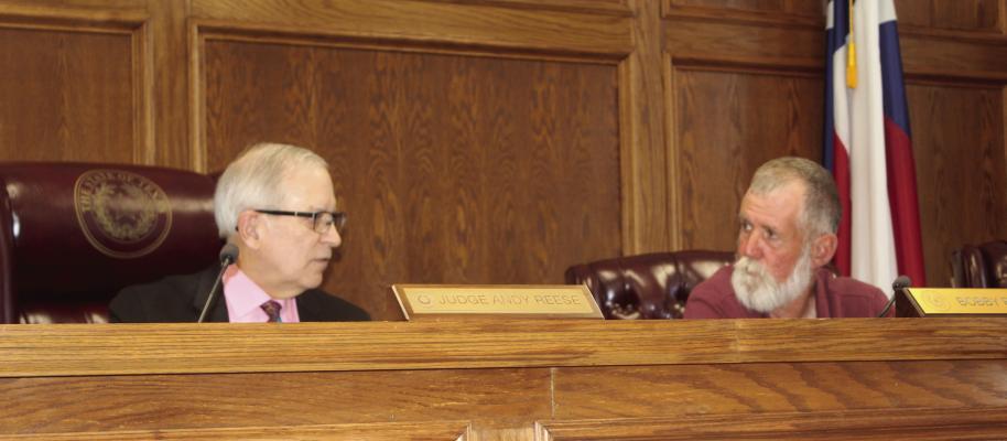 Van Zandt County Judge Andy Reese (left) and VZC Pct. 3 Commissioner Bobby Phillips discussed a proposed six-month lease agreement and payment concerning a belly dump trailer from Brazos Trailers for VZC Pct. 3 during the regular meeting of the commissioners’ court July 1. The commissioners’ court approved the agreement and payment. Photos by David Barber